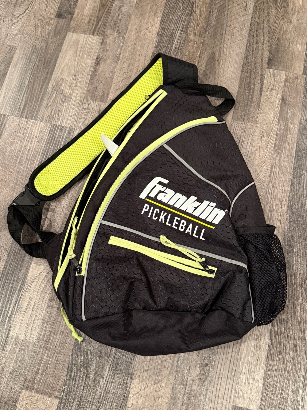 Franklin Pickleball Sling Backpack in Black and Neon Yellow